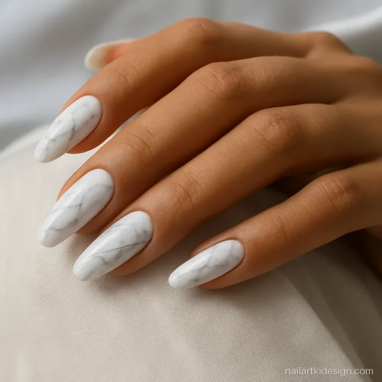 Long almond acrylic nail designs with white marble and soft grey veins